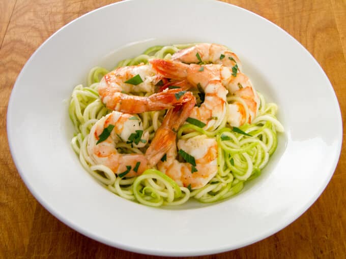 This quick and easy garlic roasted shrimp with zucchini pasta recipe is a great weeknight paleo dinner — you can have it on the table in 20 minutes. | cookeatpaleo.com