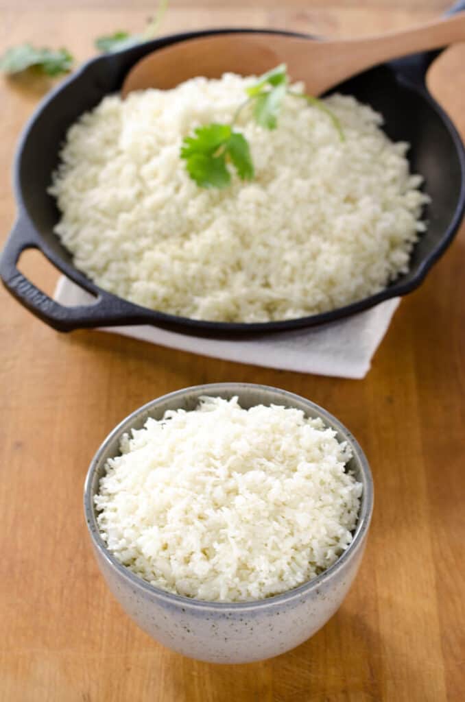 How to make cauliflower rice and stock your refrigerator or freezer with a 5-minute paleo side dish that will go with just about anything. {gluten-free, grain-free, paleo} | cookeatpaleo.com