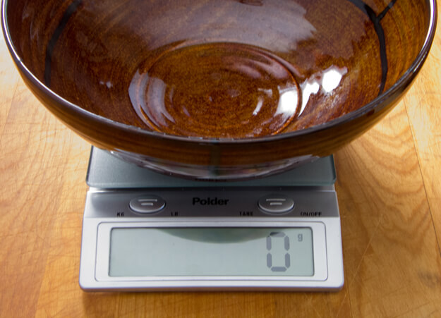 digital scale with bowl showing weight set to 0 grams