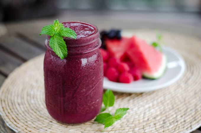 This paleo watermelon berry smoothie is light, refreshing and the perfect taste of summer. It's dairy-free, nut-free, coconut free, and refined sugar-free. | cookeatpaleo.com