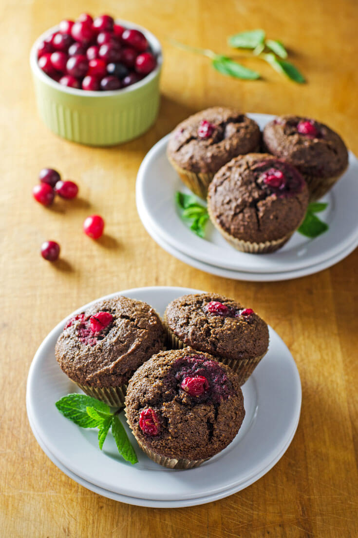 These paleo chocolate cranberry muffins are a perfect gluten-free, grain-free treat --- for breakfast, a snack, or as a dessert with coconut whipped cream. 