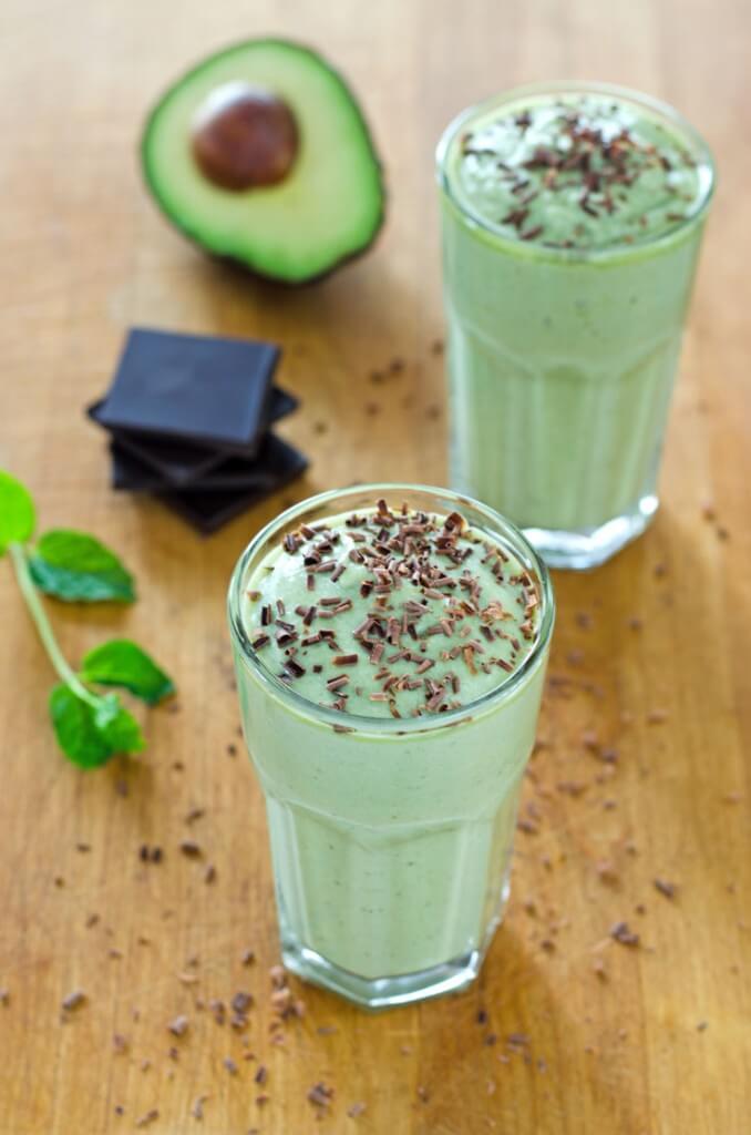 Healthy shamrock shake with avocado, dark chocolate and fresh mint.