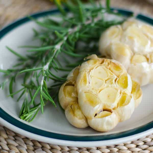 Grilled garlic with olive oil and rosemary