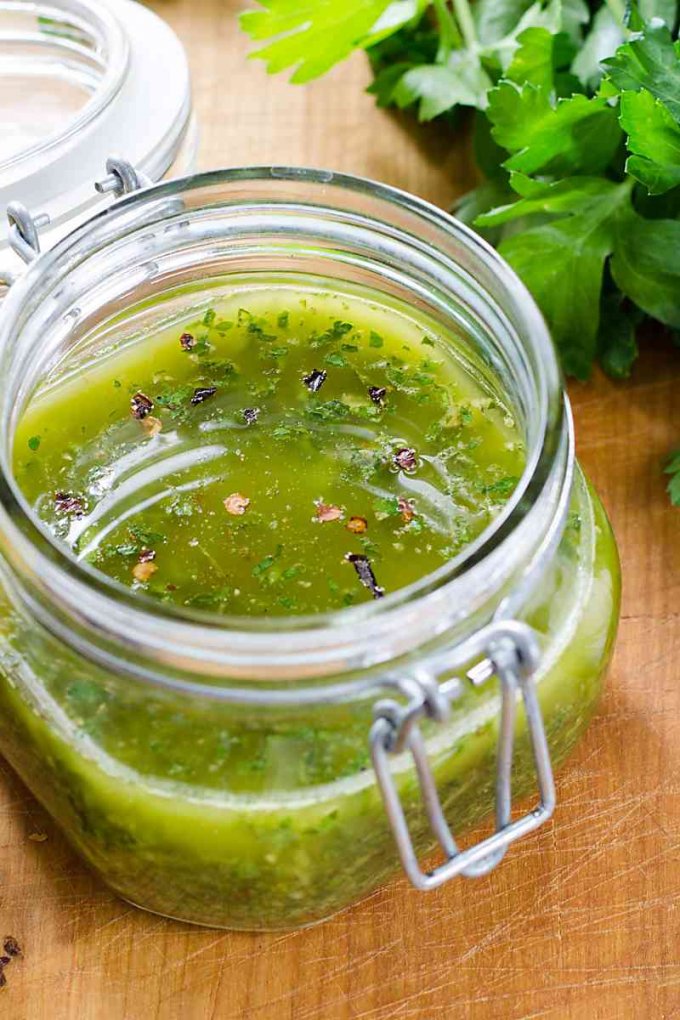 Chimichurri sauce in glass jar 