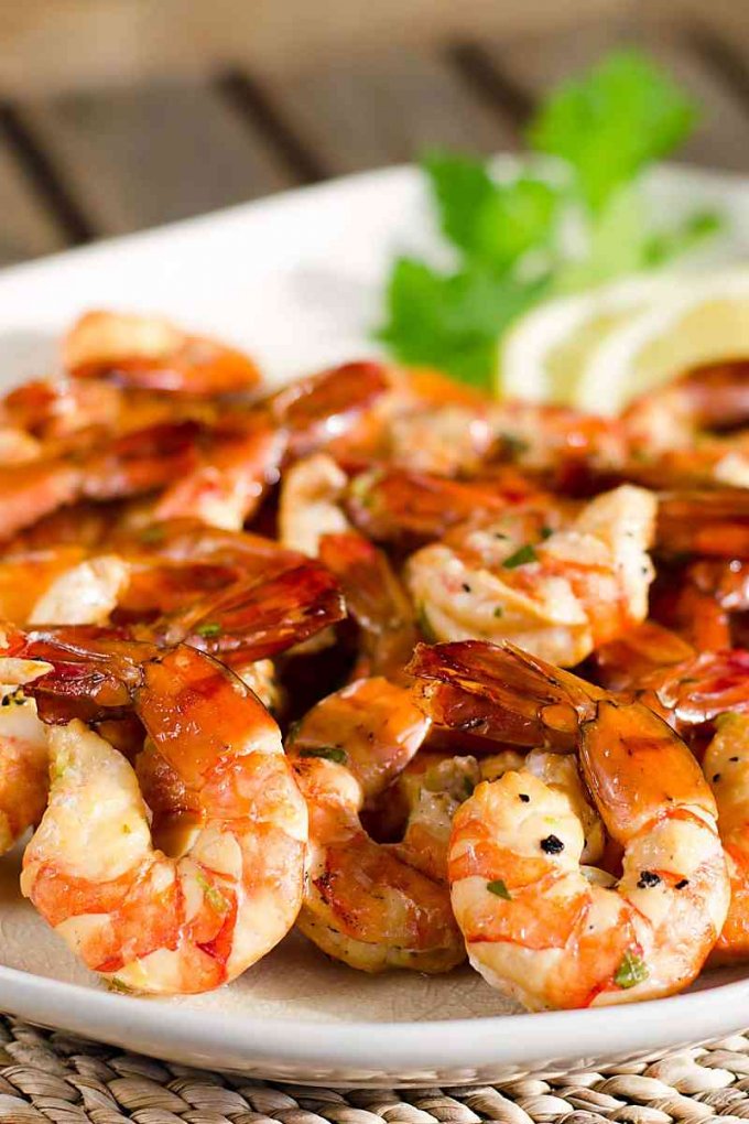 Smoked shrimp are an easy paleo, gluten-free appetizer or main dish. Serve them with a simple herb garlic butter or your favorite dipping sauce. | cookeatpaleo.com