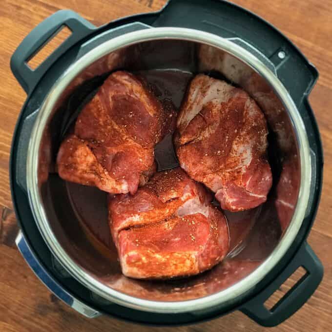 Easy pulled pork recipe with spice rub and BBQ sauce in Instant Pot