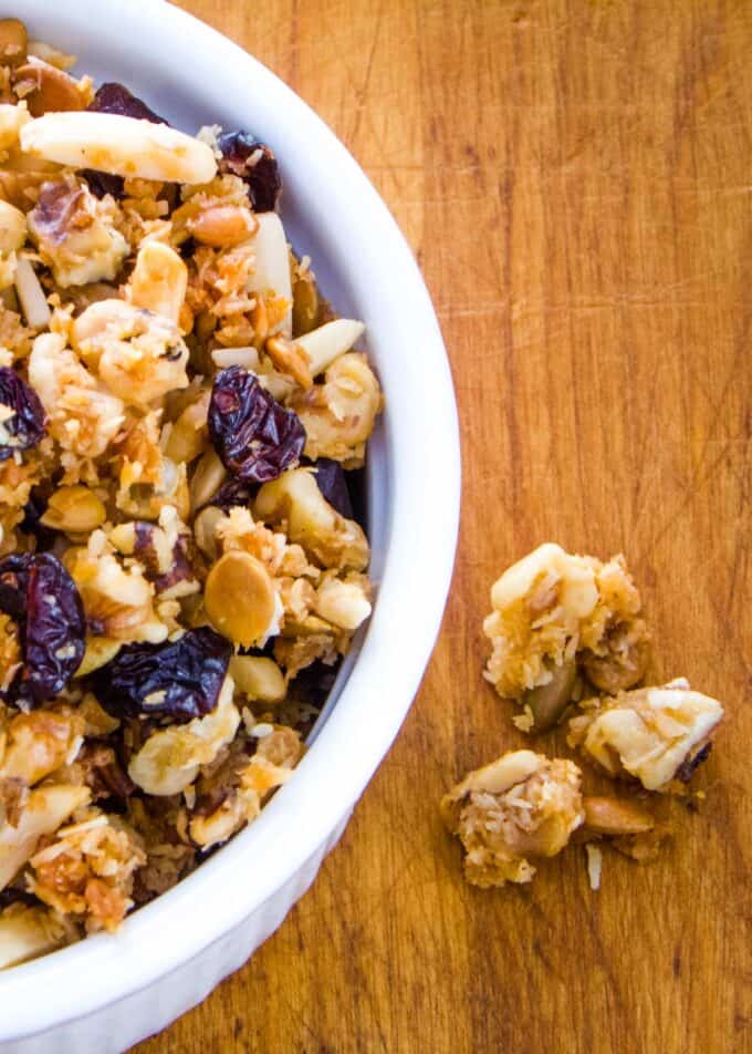 Grain-free granola clusters next to bowl of cereal