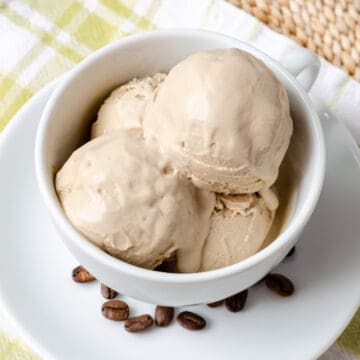 Coffee ice cream in coffee cup with coffee beans