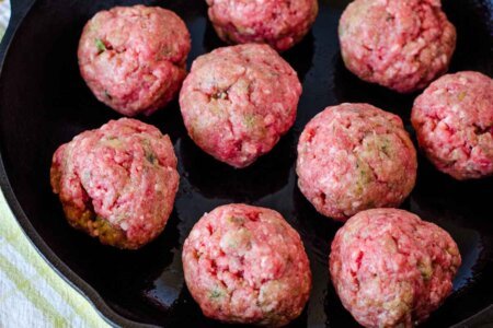 Meatballs in pan before baking