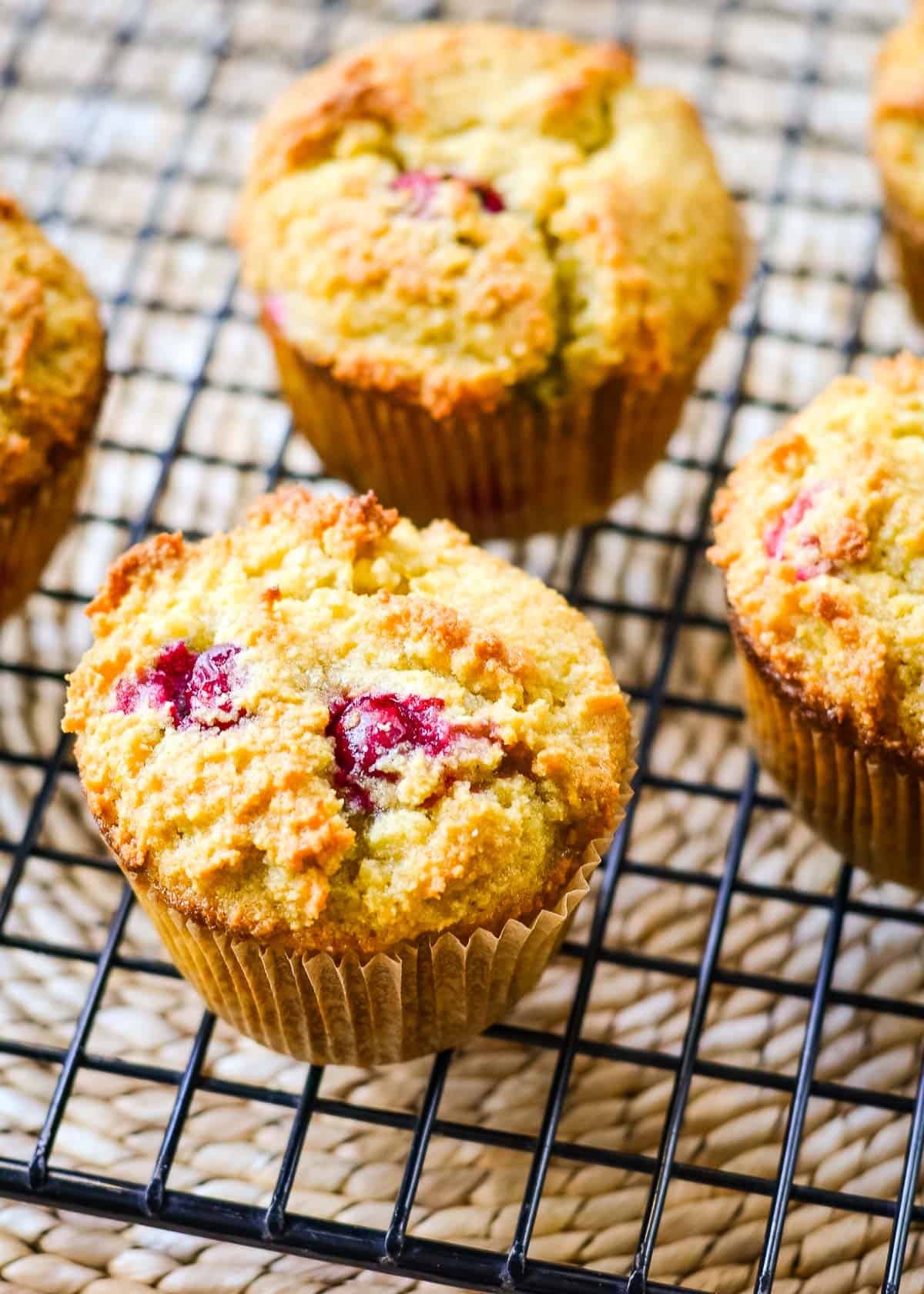 Almond flour cranberry muffins on cooling rack