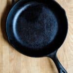 Cast iron skillet on butcher block counter