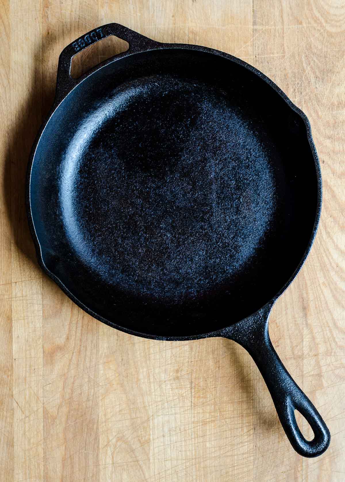 Cast iron skillet on butcher block counter