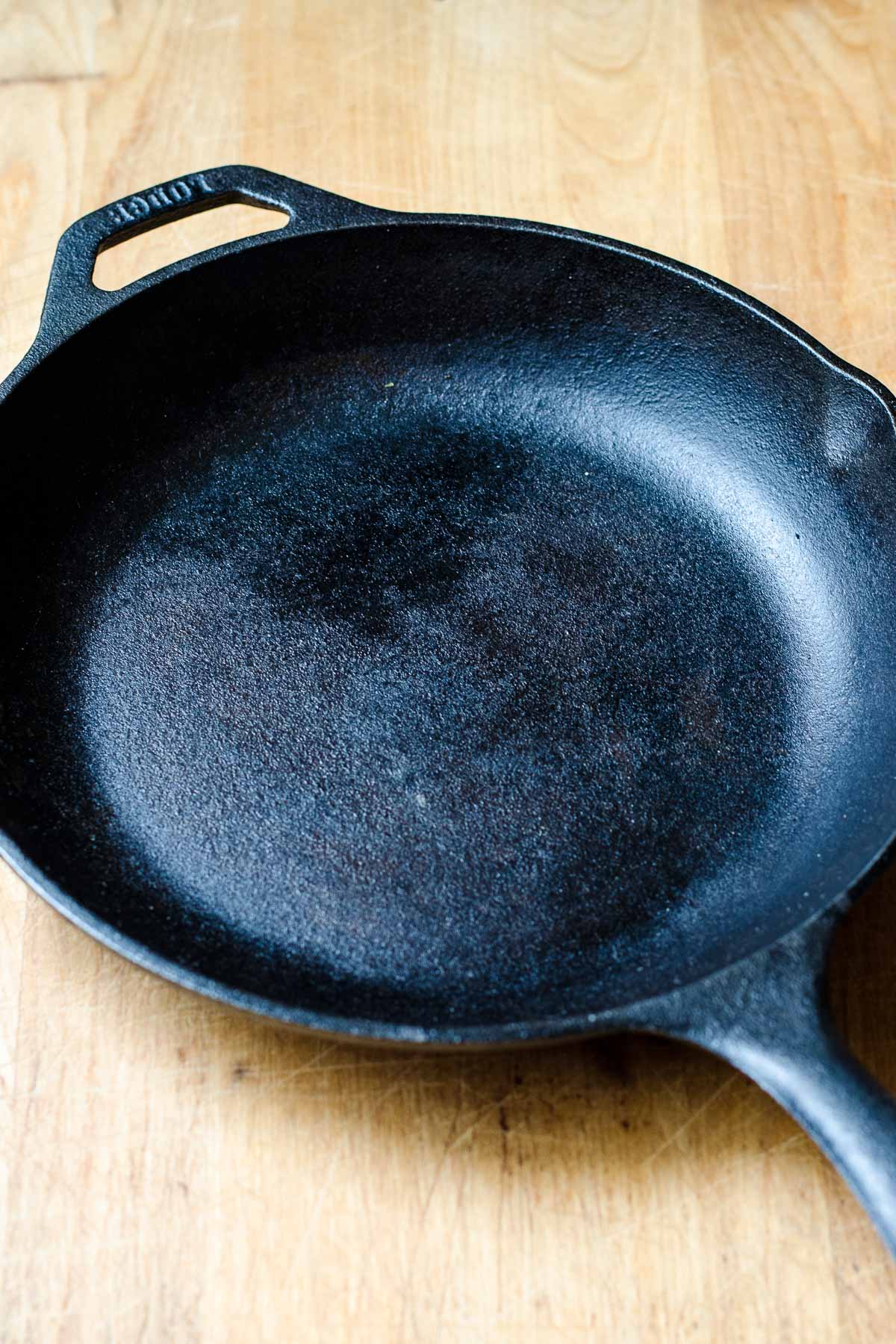 Cast iron skillet on butcher block counter